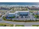 Aerial view of condo building and surrounding area at 3700 S Atlantic Ave # 402, New Smyrna Beach, FL 32169