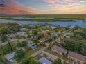Aerial view of waterfront homes and community at 119 Hardin Pl, Edgewater, FL 32132