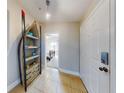 Bright entryway with tile flooring and built-in shelving unit at 406 Bouchelle Dr # 206, New Smyrna Beach, FL 32169