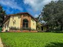 House exterior showcasing a lush green lawn at 1780 Otisco Way, Winter Springs, FL 32708