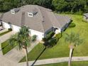 Aerial view of villa and surrounding neighborhood at 1969 Turnbull Lakes Dr, New Smyrna Beach, FL 32168