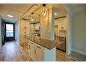 Modern kitchen with stainless steel appliances and island at 101 N Riverside Dr # 4140, New Smyrna Beach, FL 32168