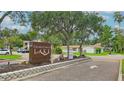 Georgetown Lake community entrance sign and landscaping at 1600 Big Tree Rd # D2, South Daytona, FL 32119