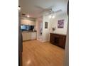 Kitchen with light wood cabinets and flooring at 2503 Woodland Dr, Edgewater, FL 32141