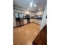 Modern kitchen with stainless steel appliances at 2503 Woodland Dr, Edgewater, FL 32141