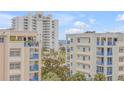 Oceanfront condo building with balconies and blue accents at 5300 S Atlantic Ave # 15-601, New Smyrna Beach, FL 32169