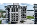 Condo building exterior showcasing waterfront location and balconies at 501 N Causeway # 2050, New Smyrna Beach, FL 32169
