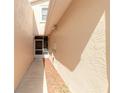 Sidewalk leading to private entrance of townhome at 2266 Hawks Cove Cir, New Smyrna Beach, FL 32168