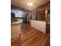 Kitchen with granite countertops and white cabinets at 1921 Jungle Rd, New Smyrna Beach, FL 32168