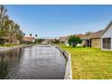 Waterfront community with lush landscaping and homes at 5336 Georgia Peach Ave, Port Orange, FL 32128
