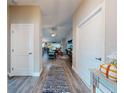 Bright and spacious entryway with hardwood floors and view of living room at 803 Pine Shores Cir, New Smyrna Beach, FL 32168