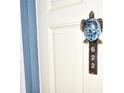 Unit door with sea turtle knocker and number 622 at 5207 S Atlantic Ave # 0622, New Smyrna Beach, FL 32169