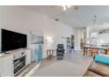 Bright living room with hardwood floors and comfortable seating at 106 Tuscany Villas Drive, Edgewater, FL 32141