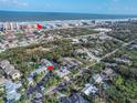 Aerial view showing home's location near the beach and other attractions at 4017 Saxon Dr, New Smyrna Beach, FL 32169