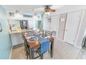 Kitchen features wood cabinets, modern appliances, and a breakfast bar at 4590 S Atlantic Ave # 263, Ponce Inlet, FL 32127