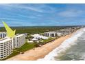 Oceanfront property view, showing building's location on the beach at 5201 S Atlantic Ave # 809A, New Smyrna Beach, FL 32169