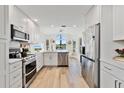 Modern kitchen with stainless steel appliances and ample cabinet space at 663 Wellesley Ct, New Smyrna Beach, FL 32168