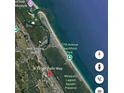 Property location shown with nearby beach and park at 131 W Palm Way, Edgewater, FL 32132