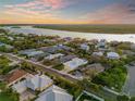 Aerial view showcasing the property's waterfront location and surrounding neighborhood at 2022 N Peninsula Ave, New Smyrna Beach, FL 32169