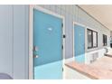 Condo unit entrance with keyless entry at 3509 S Atlantic Ave # 108 & 109, New Smyrna Beach, FL 32169