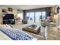 Spacious living room with ocean view, comfortable seating, and open floor plan at 4501 S Atlantic Ave # 4170, New Smyrna Beach, FL 32169