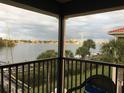 Spacious screened balcony boasting panoramic waterfront views at 460 Bouchelle Dr # 305, New Smyrna Beach, FL 32169