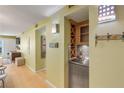 Built-in wet bar with wine rack and mini-refrigerator at 4151 S Atlantic Ave # 112, New Smyrna Beach, FL 32169