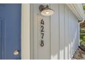 Close-up of condo's address number on the building at 4278 Sun Village Ct # 27D, New Smyrna Beach, FL 32169