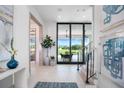 Elegant entryway showcasing a view of the pool and golf course at 4133 Grande Brick Loop # 14, Orlando, FL 32837