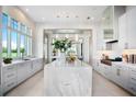 Gourmet kitchen with large island, stainless steel appliances, and an open floor plan at 4157 Grande Brick Loop # 18, Orlando, FL 32837