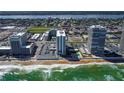 Aerial view of beachfront high-rise condos, showcasing beach and city views at 2800 N Atlantic Ave # 105, Daytona Beach, FL 32118