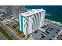 Oceanfront condo building with parking and roadside view at 2800 N Atlantic Ave # 105, Daytona Beach, FL 32118