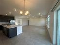 Spacious living room with tile flooring and lots of natural light at 1217 Hillbridge Dr, Haines City, FL 33844