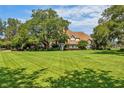 Beautiful two-story home situated on a large lot with lush landscaping at 10980 Jim Edwards Rd, Haines City, FL 33844