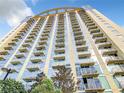 High rise building exterior with balconies and modern design at 155 S Court Ave # 2107, Orlando, FL 32801