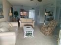 Living room with comfortable seating and carpet at 715 S Beach St # 306D, Daytona Beach, FL 32114