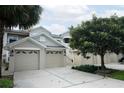 Two-story townhome with attached garage at 9447 Myrtle Creek Ln # 112, Orlando, FL 32832