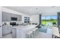 Modern kitchen with island and view at 4831 Spangle Drive Way, St Cloud, FL 34769