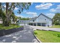 Luxury home with a long driveway and a two-car garage at 1317 Spring Lake Ter, Ocoee, FL 34761