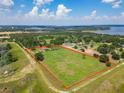 Aerial view showing a home on a spacious lot, ideal for country living at 16300 Johns Lake Rd, Clermont, FL 34711