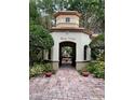 Community entrance with a fountain and landscaping at 824 Camargo Way # 106, Altamonte Springs, FL 32714