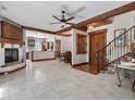 Open living room with high ceilings and a fireplace at 13857 Marine Dr, Orlando, FL 32832