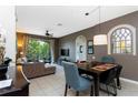 Open concept living and dining area with modern furnishings at 2813 Almaton Loop # 301, Kissimmee, FL 34747