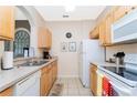 Well-equipped kitchen with modern appliances and ample counter space at 2813 Almaton Loop # 301, Kissimmee, FL 34747