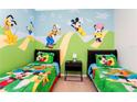 Fun ' bedroom with twin beds, themed decor, and ample light at 2813 Almaton Loop # 301, Kissimmee, FL 34747