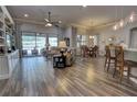Open living space with hardwood floors and access to pool at 5769 Saybrook Cir, Sanford, FL 32771