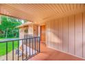 Private condo entrance with a covered balcony at 100 Sweetgum Woods Ct # 1D, Deltona, FL 32725