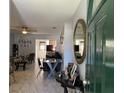 Inviting entryway with view of living and dining area at 241 N Hill Ave, Deland, FL 32724
