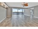 Large living room with tile floors and water views at 645 Marina Point Dr # 6450, Daytona Beach, FL 32114