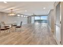 Spacious dining area with glass table and water views at 645 Marina Point Dr # 6450, Daytona Beach, FL 32114
